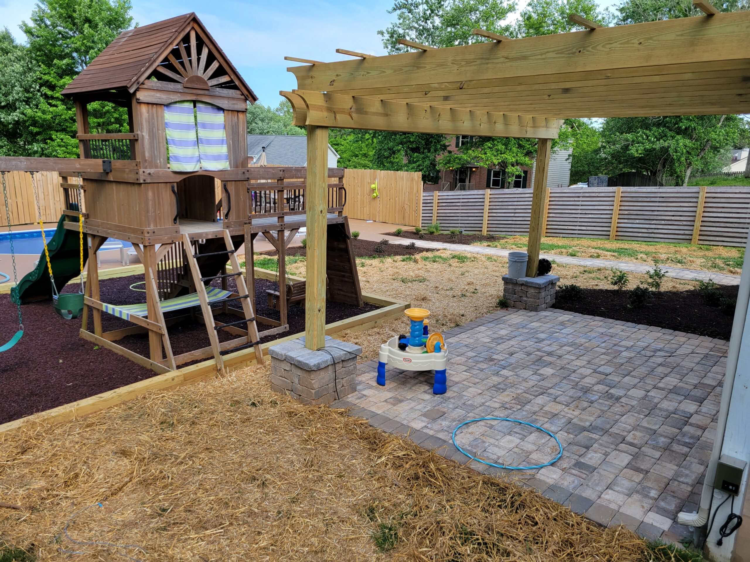 Paver patio and kid's playground