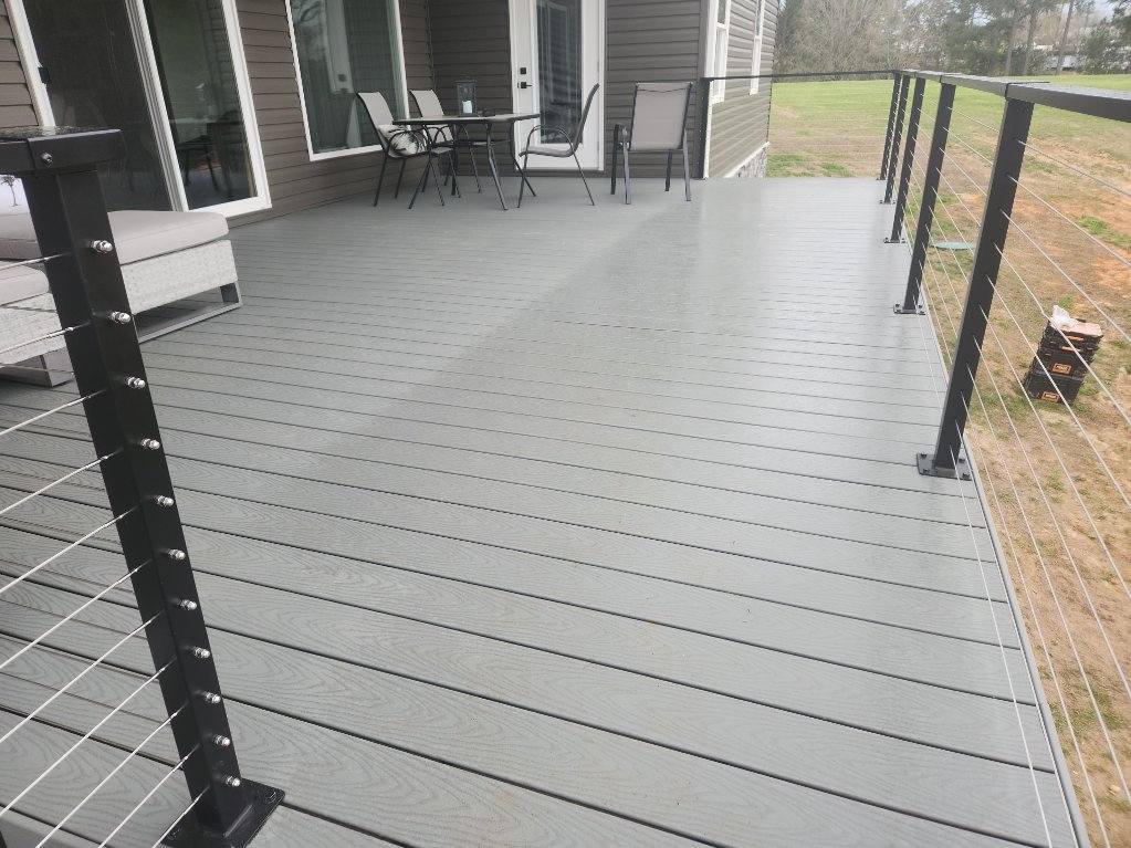 completed deck with Trex composite decking and cable railing